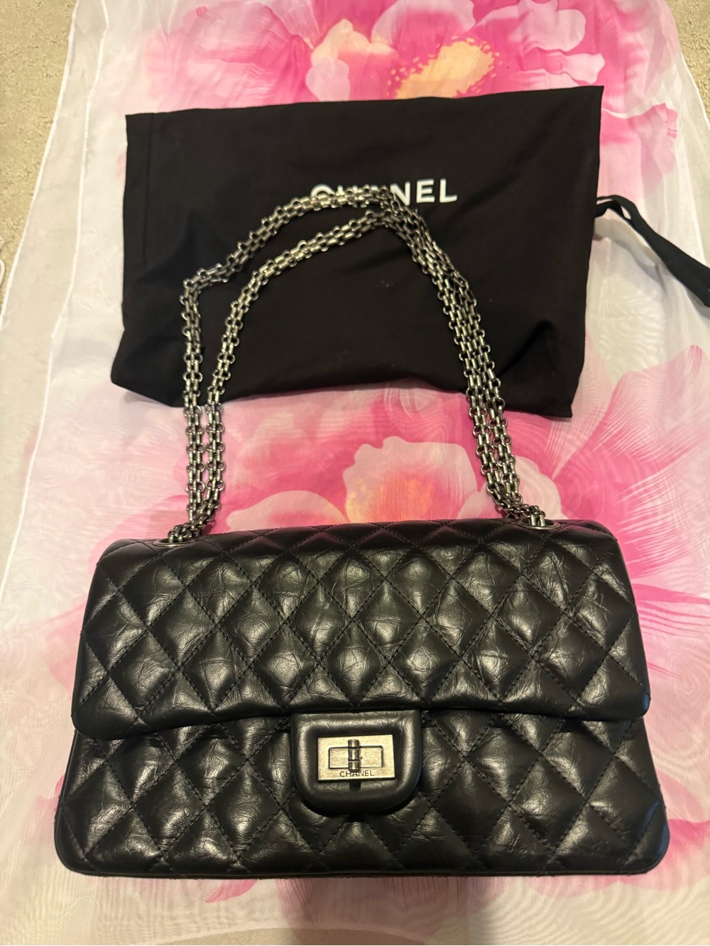CHANEL Black Quilted Leather Shoulder Bag with Silver Chain Strap